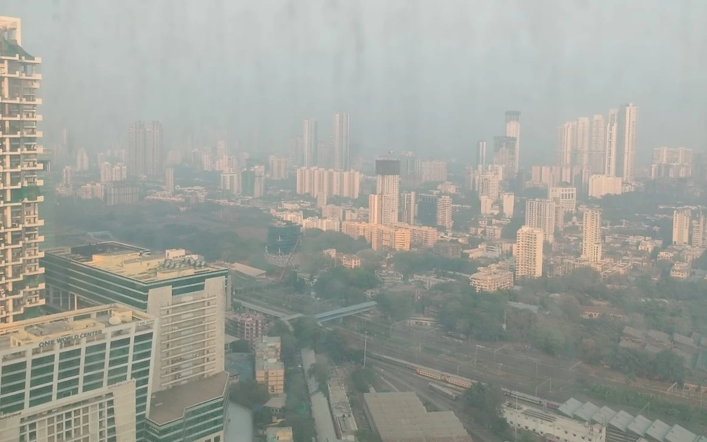 Mumbai city view towards One World Center and Lower Parel from the 32nd floor at Lodha Park Tower Adrina, Worli