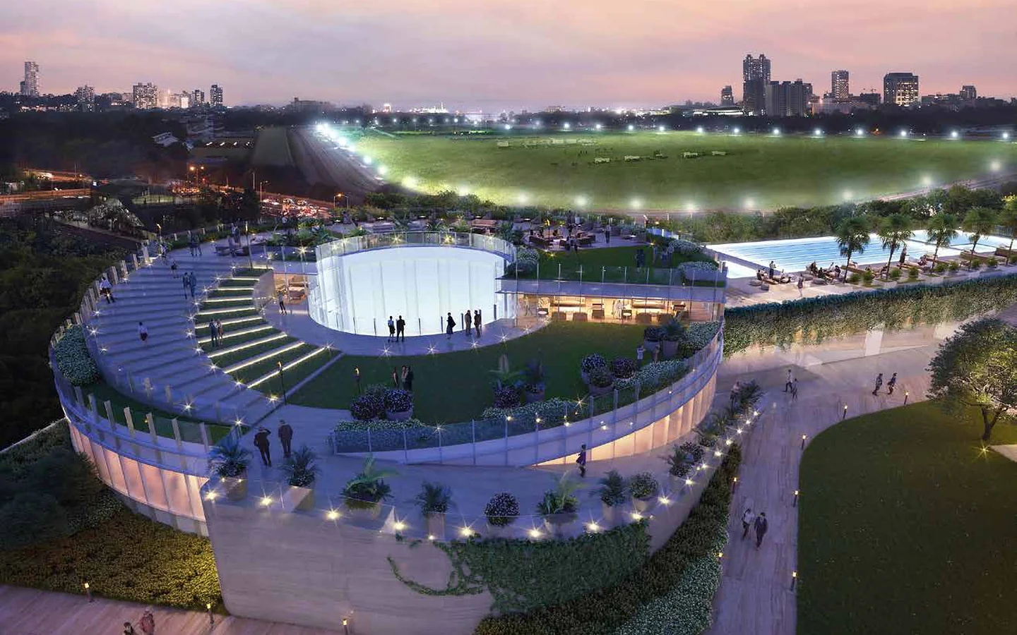 Circular podium clubhouse at night next to Mahalaxmi Racecourse at Piramal Mahalaxmi, South Mumbai