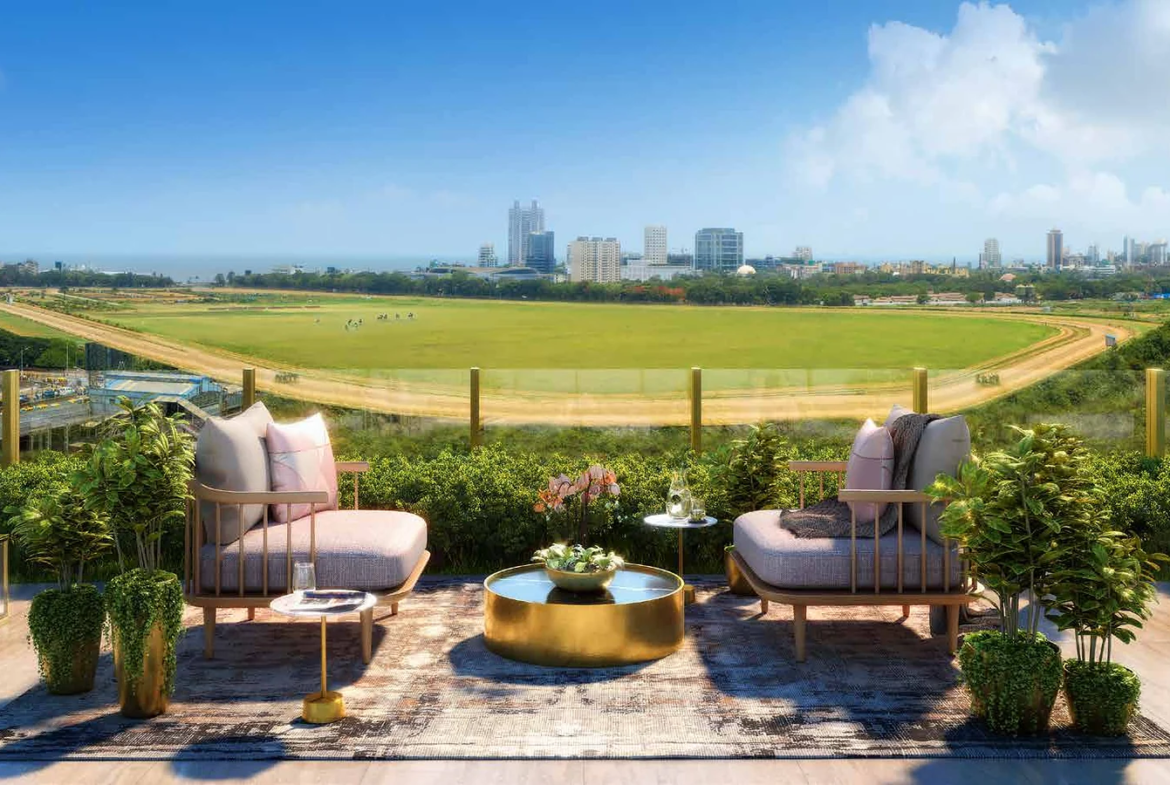 Open-air clubhouse lounge deck overlooking Mahalaxmi Racecourse at Piramal Mahalaxmi, South Mumbai