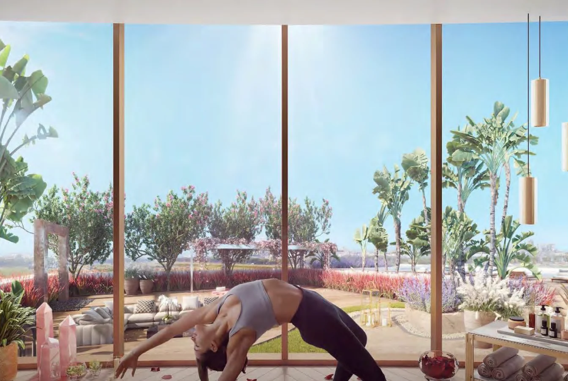 Yoga room with floor-to-ceiling glass and garden view at Piramal Mahalaxmi, South Mumbai
