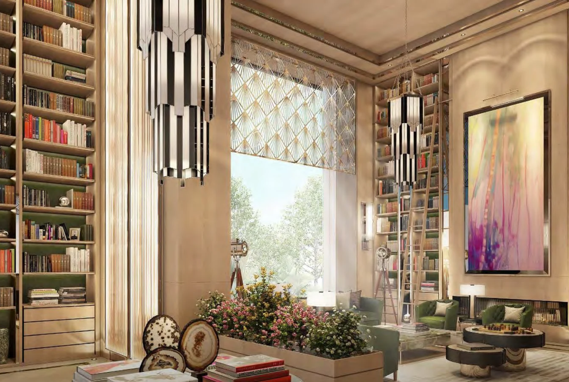 Double-height library and reading lounge with bookshelves at Piramal Mahalaxmi, South Mumbai