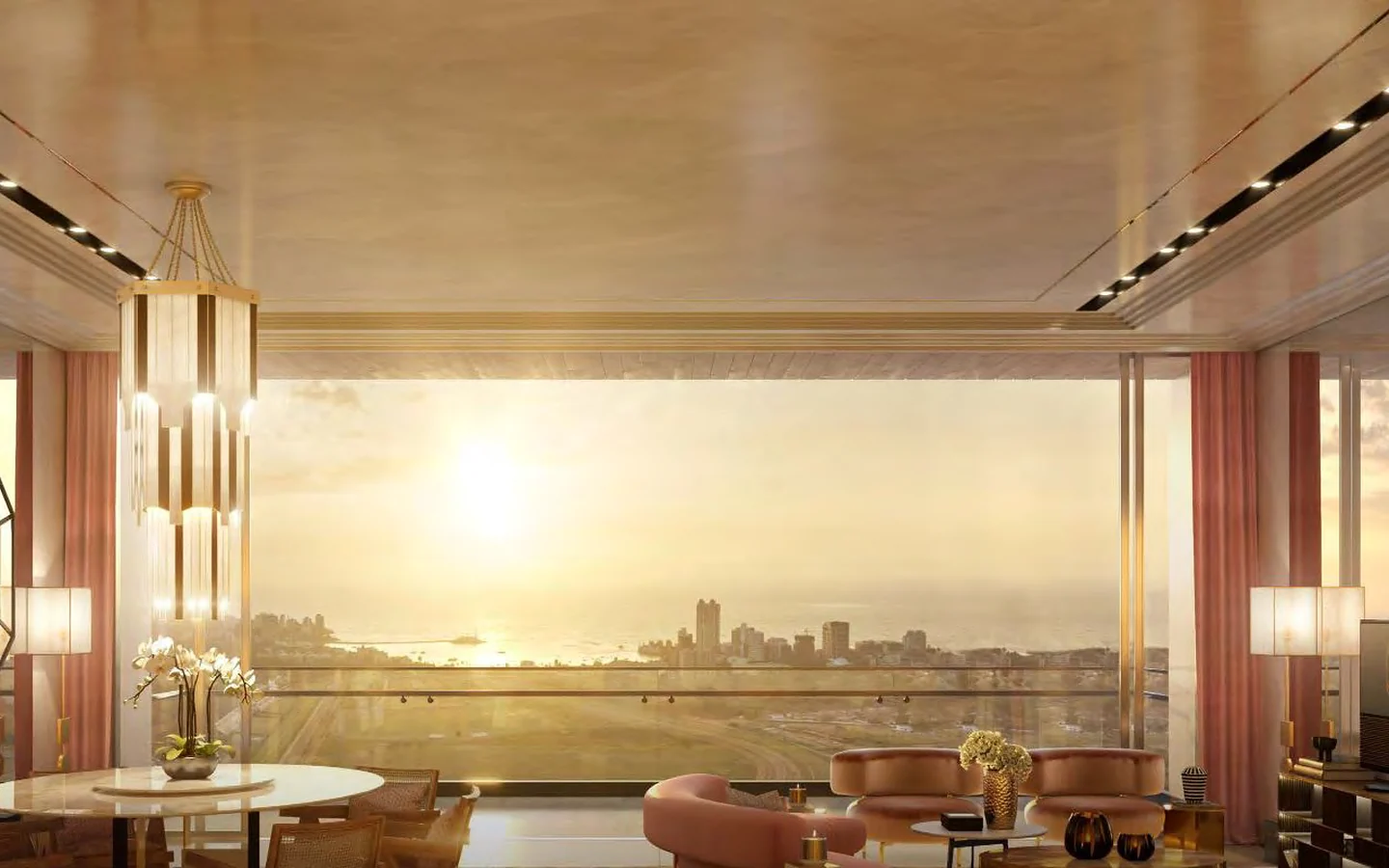 Sample living room with full-width windows overlooking the sea at sunset at Piramal Mahalaxmi, South Mumbai